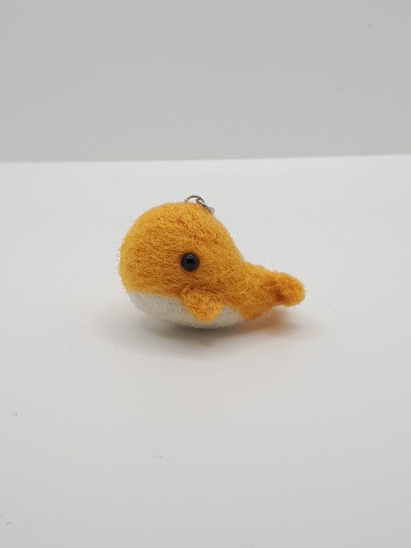 an orange whale keychain