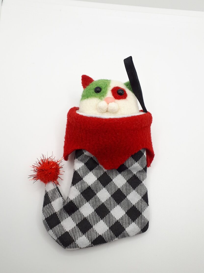 a christmas cat in a stocking