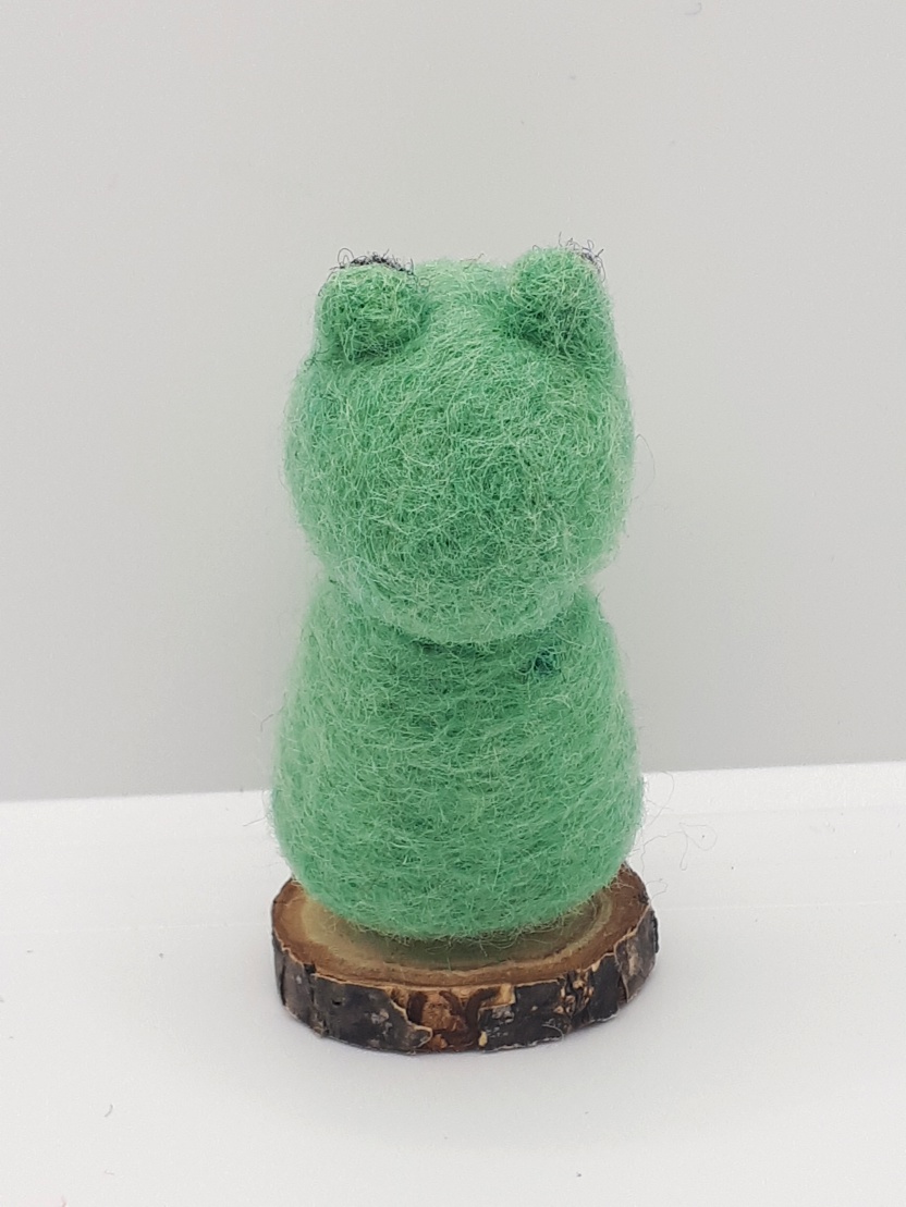 Child in Frog Raincoat - Image 6