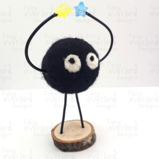 Soot Sprite with Yellow and Blue Stars
